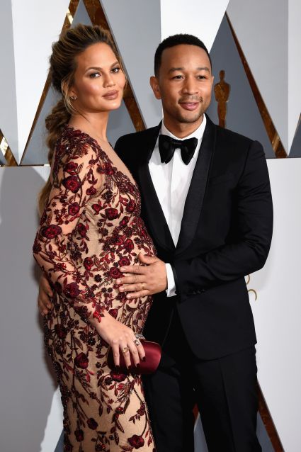 HOLLYWOOD, CA - FEBRUARY 28:  Model Chrissy Teigen and musician John Legend attend the 88th Annual Academy Awards at Hollywood & Highland Center on February 28, 2016 in Hollywood, California.  (Photo by Ethan Miller/Getty Images)